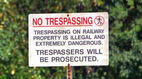 4K No Trespassing, Private Property, Danger Warning at Rail Road Train Track Video stock 65411237