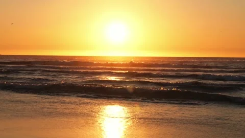 4K Ocean Sunset Loop - Calm Waves and Warm Colors Stock Footage 310058485