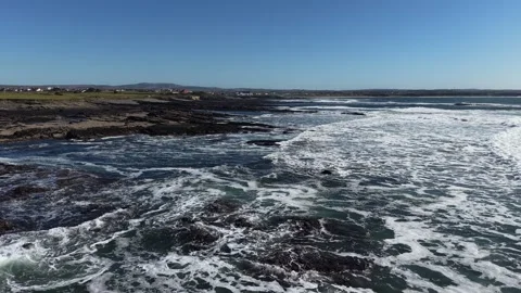 4K Ocean Waves Along Rocky Coastline Stock Footage 333704350