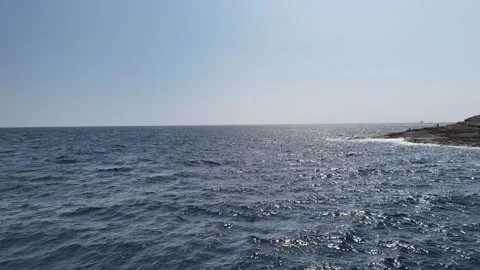 4K Ocean Waves and Horizon Near Hook Lighthouse Stock Footage 333412370