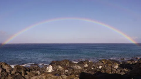 4K Ocean Waves Rocks And Rainbow 01 Stock Footage 58931067