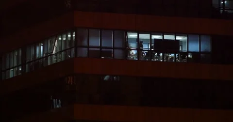 4k Office building windows lighting at night &amp; urban architecture glass house. Stock Footage 40635608
