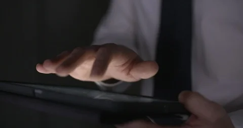 4k Office worker scrolling through news feed late at night on a tablet. 스톡 동영상 90571864