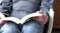 4k old caucasian man's hands flip through book sitting in armchair 4k or 4k+ Resolution