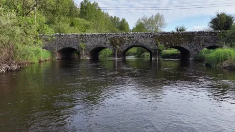 4K Old Stone Arch Bridge Over Calm River Stock-Footage 334231412