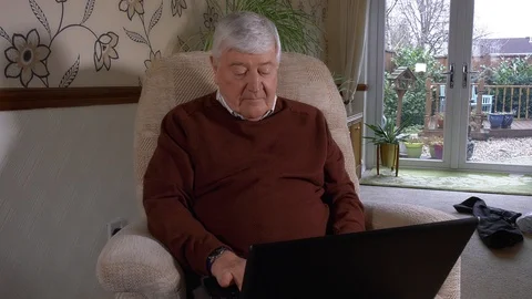 4K - Older Man Seated Using Laptop Video stock 87162495