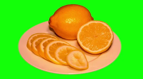 4k – One lemon, half and pieces on plate Stock Footage 56781752