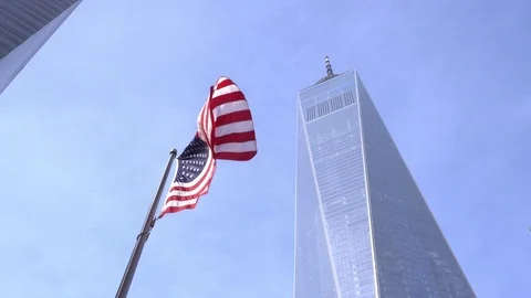 4K One World Trade Center New with American Flag Waving New York City NYC Build Stock Footage