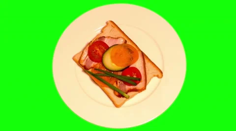 4k opened sandwich with bacon and fresh vegetables on plate Stock Footage 49615014