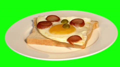 4k opened sandwich with fried egg and sausages on plate Stock Footage 50009735
