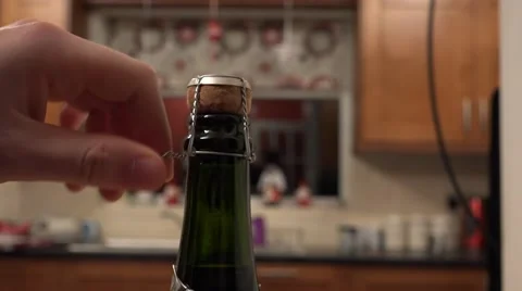 4k opening and uncorking a bottle of champagne or sparkling wine Stock Footage 45531832