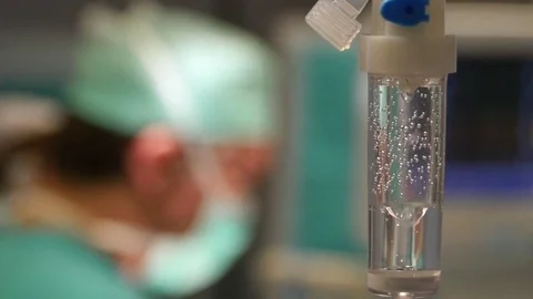 4k. Operating room drain. The drops of anesthesia fall into the receptacle. Stock Footage 75786002