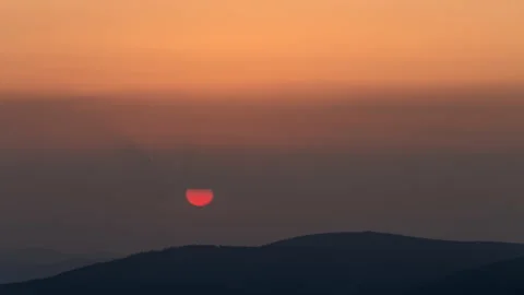 4K Orange sunset above the clouds Stock Footage 255515020