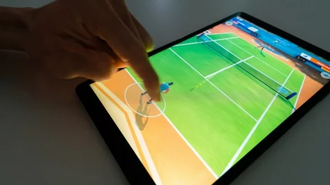 4k orbit timelapse of playing game on an android tablet Stock Footage 130043683