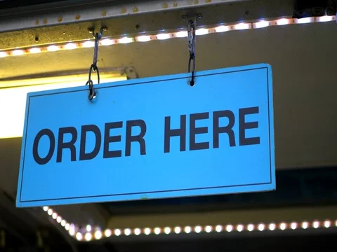 4K Order Here Hanging Sign, Text Illustration Message, Food Truck Restaurant Stock Footage