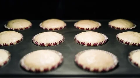 4K - Oven baking muffins. Cooking muffins. interval shooting. Stock Footage 156428972