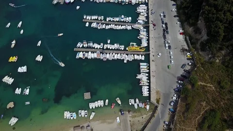 4K Overhead aerial view of small boats anchored in harbor Stock Footage 94951255