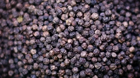 4K Overhead Falling Black Peppercorns Pouring Dynamic Shot Stock Footage 336939104