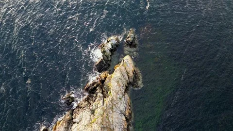 4k Overhead Shot of Waves on Rocks in the Ocean Stock Footage 268681018