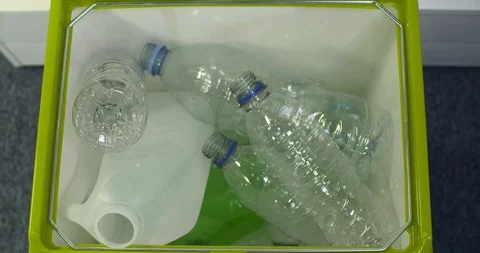 4k overhead timelapse of recycle bin being filled with plastic bottles. Stock Footage 96535993