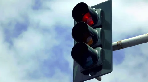 4K Overhead traffic light is red,then turns green Stock Footage 53846734