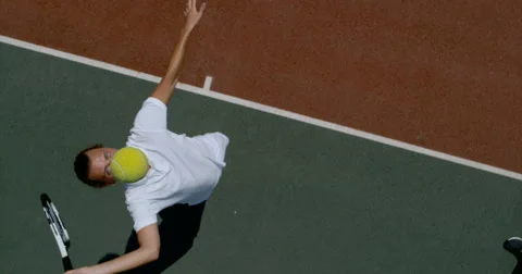 4K Overhead view in super slow motion tennis player hitting the ball during game Stock-Footage 67806229