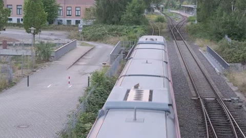 4K Overhead View of a Train Moving Along Railway Tracks Stock Footage 221171127