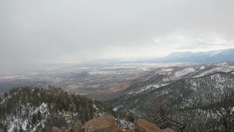 4K Overlook of City From Front Range Clouds Moving Into Area in Colorado Springs Stock Footage 105361882