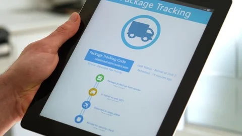 4K Package Delivery Tracking app on Tablet Stock Footage 74972179