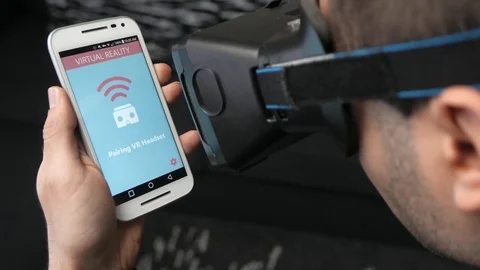 4K Pairing VR Headset With Smartphone - Virtual Reality Closeup Video stock 71322136