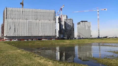 4K pan of modern buildings construction in Milan, Italy Stock Footage 148756988