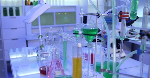 4K Pan right closeup biologist woman exchanging liquid material micro pipette Stock Footage 78778364