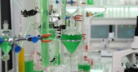4K Pan right closeup biologist technician specialist work microscopic tests job Stock Footage 78790557