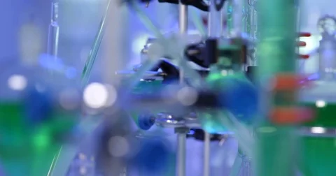 4K Pan right closeup chemist woman examining data microscope microbiology room Stock Footage 78773265