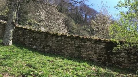 4k pan right-left of stone path leading to the sanctuary of San Francesco  Stock Footage 75168701