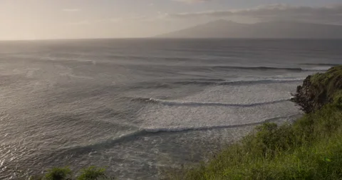 4K: Panning Across Ocean at Sunset With Waves Peeling Stock Footage 63158595