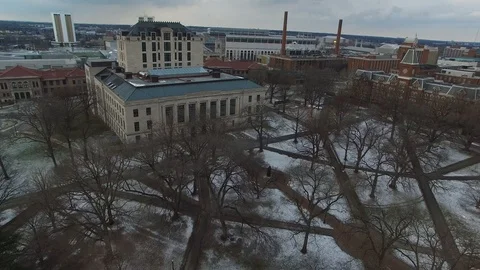 4K PANNING DRONE SHOT OVER THE SNOWY GRASS OF OHIO STATE'S NORTH OVAL Video stock 101813597