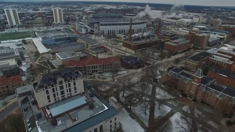 4K PANNING DRONE SHOT OF SNOWY OHIO STADIUM AT OHIO STATE UNIVERSITY Video stock 101813853