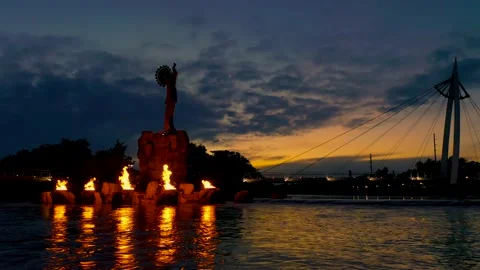 4k panning drone video flames Keeper of Plains downtown Wichita Kansas Stock Footage 201210962