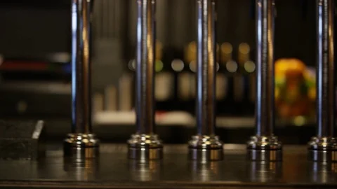 4K Panning Shot Of Barman Setting Down Cocktail On Bar Top Video stock 75622813