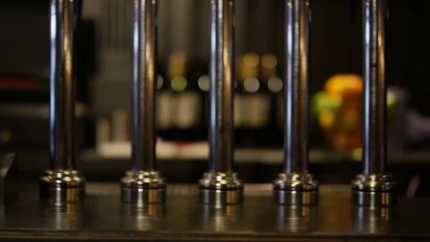 4K Panning Shot Of Barman Setting Down Cocktail On Bar Top Video stock 75624176