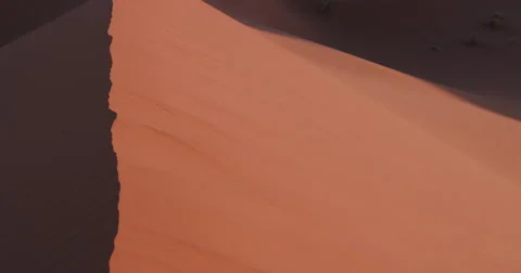 4K panning shot of the endless sand dunes of the Namib desert Stock Footage 64696872