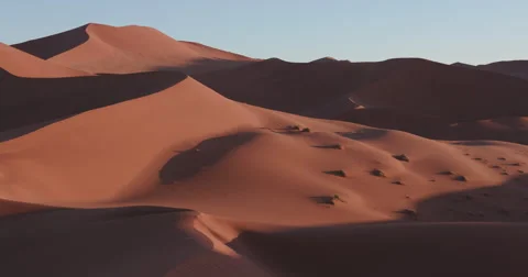 4K panning shot of the endless sand dunes of the Namib desert  Stock Footage 64697062