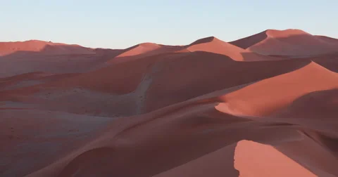 4K panning shot of the endless sand dunes of the Namib desert Stock Footage 64697063