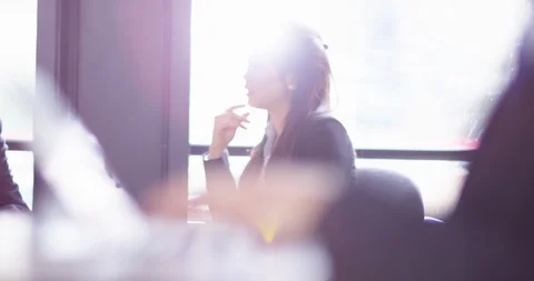 4K Panning shot &amp;focus pull from businesswoman talking to hands typing on laptop Stock Footage 104121330