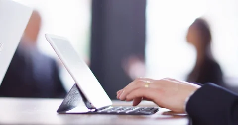 4K Panning shot with focus pull, mature businessman in a meeting Stock Footage 104122174