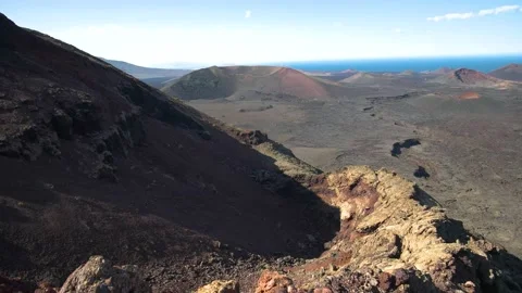 4k Panning shot from top of volcano. Timanfaya, Lanzarote Stock Footage 154553456