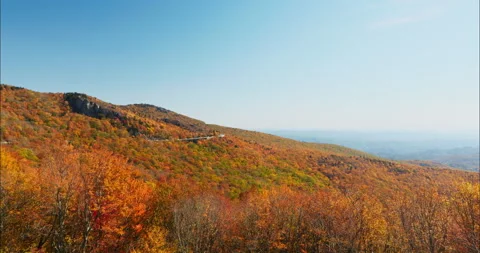4K Panoramic view of Autumn foliage the mountains. Fall landscape with vivid Stock Footage 220898441