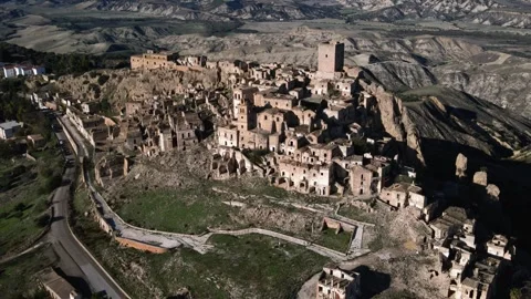 4K panoramic view of Craco, a ghost town in the Basilicata region of Italy. Stock Footage 304667816