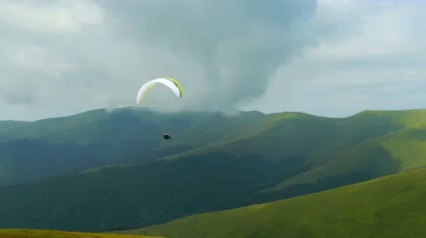4k, Paraglider flying high in the mountains Video stock 54503478